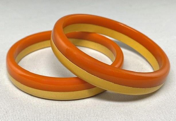 BB427 pr burnt orange and maize laminate bakelite bangles